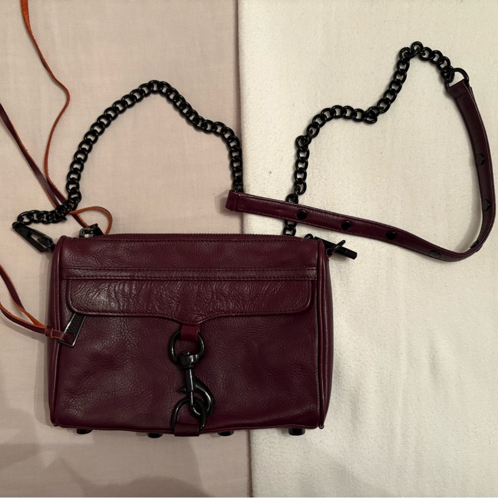 maroon leather with black metal detailing rebecca minkoff crossbody bag